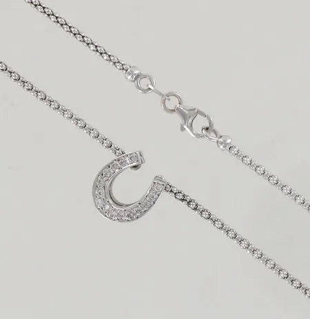 Timanttikaulakoru 15xn.0.01ct, ketjun pituus 43cm, 585 valkokulta, paino 5,5g