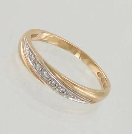Timanttisormus 5xn.0.005ct, koko 17¾, 750 kelta- ja valkokulta, paino 2,7g