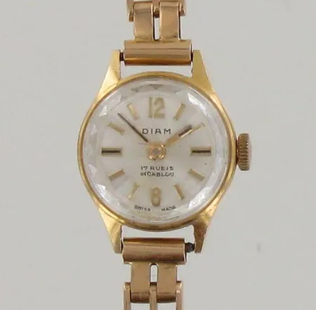 Viallinen kultarannekello, 585br ja 750br, paino 16,0g