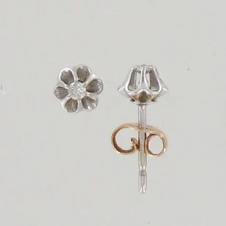 Timanttikorvanapit 2xn.0.03ct, 585 valkokulta, taustat keltakultaa, paino 0,9g