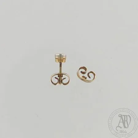 Timanttikorvanappi 1xn.0.14ct ja lisälukko, 585, paino 1,1g