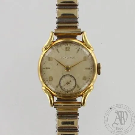 Kultarannekello, Longines, mekaaninen, kaiverrettu ja käytön jälkiä, Ø 22mm, 750br, paino 28,4g, metallinen joustinranneke
