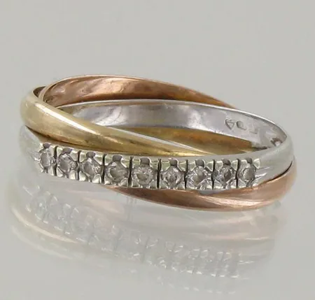 Timanttisormus 9xn.0.03ct, malli Cartier, koko 19, 585 kelta-puna- ja valkokulta, paino 3,8g