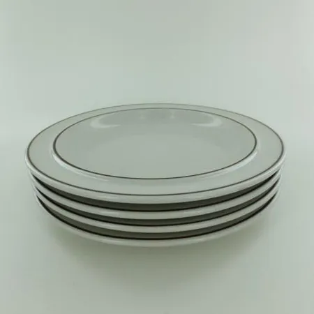 Neljä pullalautasta Arabia, Fennica, Richard Lindh, Vuosi 1974-85, Ø 175mm.