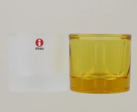 Kaksi Kivi-tuikkua, Iittala, Marimekko, keltainen ja matta-kirkas 
