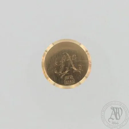 Kellon takakansi, kaiverrettu, Ø 20mm, 585, paino 2,2g