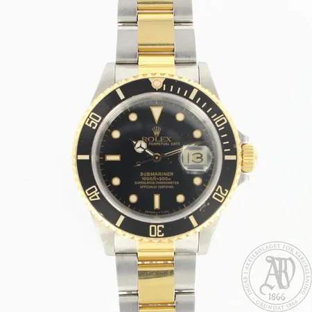 Teräsrannekello, Rolex Submariner, Ø 40mm, rannekkeen pituus 170-180mm, sarjanumero: L373468, refnr: 16613, Cal. 3135, vuodelta 1989, aitoustodistus, paperit ja laatikko