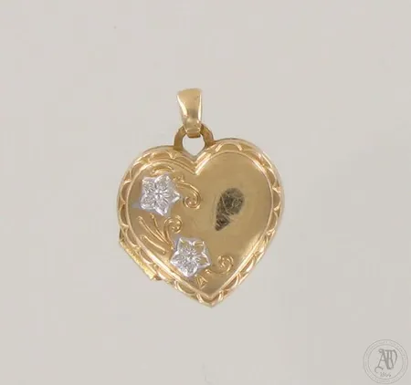 Medaljonki, korkeus 20mm, 585br, paino 1,3g 