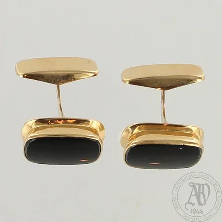 Onyx-kalvosinnapit, 585br, paino 6,3g 