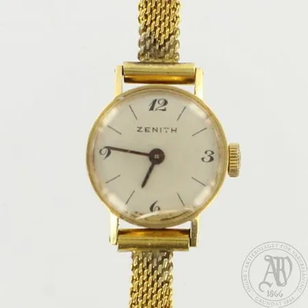Kultarannekello Zenith, taulun Ø 16,5mm, lasi rikki, rannekkeen pituus 165mm, 750br, ranneke kullattua metallia, 585br, paino 12,0g 