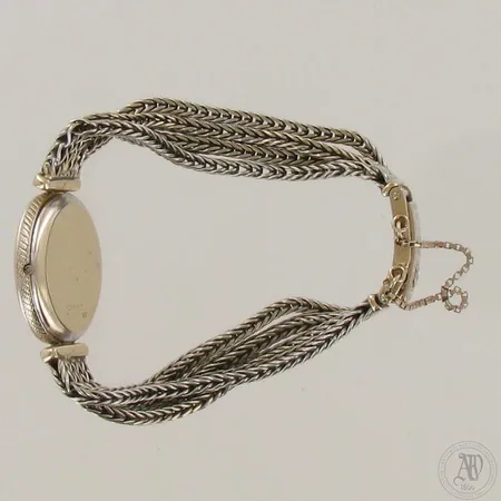 Viallinen kultarannekello Omega, 750br, paino 40,6g