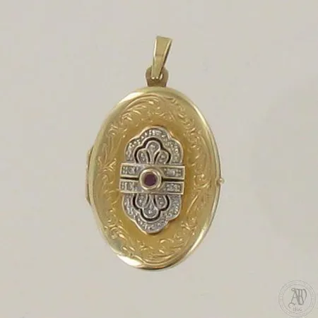 Medaljonki timanteilla ja rubiinilla 4xn.0.005ct, takakannessa pieni painauma, 585br, paino 5,5g