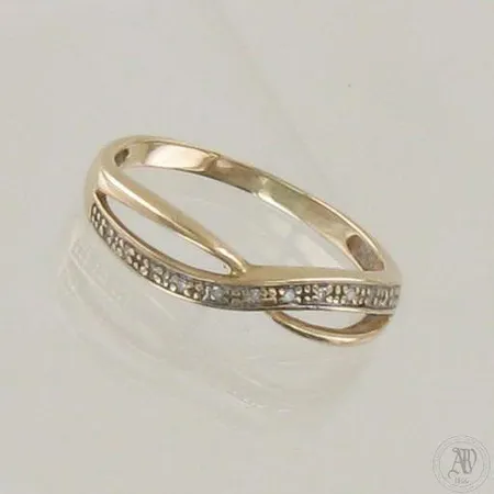 Timanttisormus 11xn.0.005ct, koko 18¾, 585 kelta- ja valkokulta, paino 2,0g