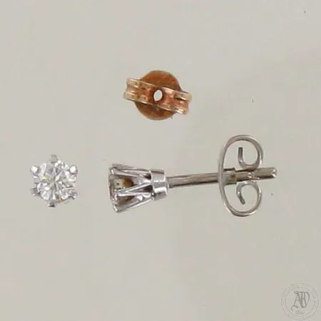 Timanttikorvakorut 2xn.0.15ct, 750 valkokulta, toinen tausta 585 keltakulta, paino 1,2g ja 0,1g