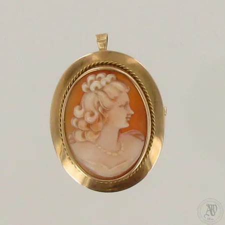 Cameerintakoru, korkeus 38mm, vuodelta 1952, 585br, paino 7,3g