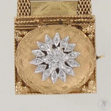 Kultarannekello Geneva timanteilla 1xn.0.02ct ja 20xn.0.005-0.01ct kaikki ovat 8/8 hiontaisia, mekaaninen, hihnan pituus 185mm, leveys 28mm, varmuusketjulla, 585br, paino 79,0g 