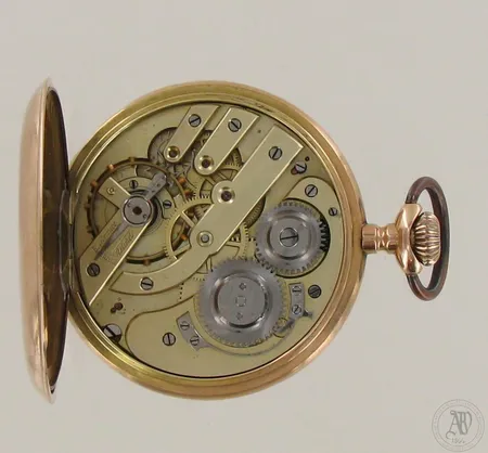 Kultataskukello, kaiverrettu, Ø 52mm, välikuori metallia, 585br, paino 89,2g