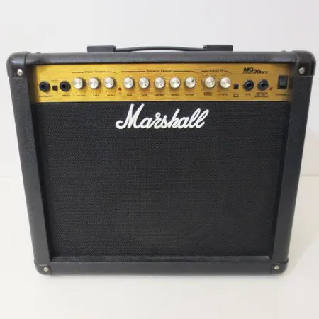 Kitaravahvistincombo Marshall MG30DFX, 2-kavava, teho 30w, 1x10", kuuloke- ja cdliitäntä, kanavanvaihtaja jalkakytkimellä. Ota yhteys panttilainaamoon kuljetusmaksusta sopimiseksi.
