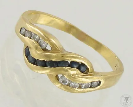 Viallinen sinisafiirisormus timanteilla 8xn.0.02ct, 750br, paino 3,2g