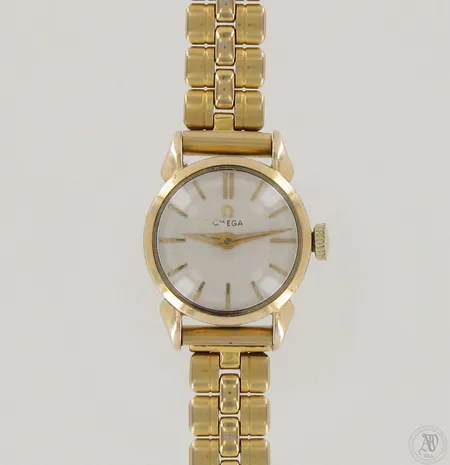 Viallinen kultarannekello Omega, mekaaninen, teräsranneke, 585br, paino 30,1g