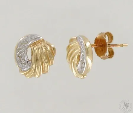 Timanttikorvanapit 2xn.0.005ct, korkeus 9mm, 585 kelta- ja valkokulta, paino 2,2g