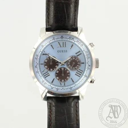 Teräsrannekello Guess, ref.W0360G6, Ø 45mm, lieviä käytön jälkiä, nahkarannekkeen pituus 180-230mm