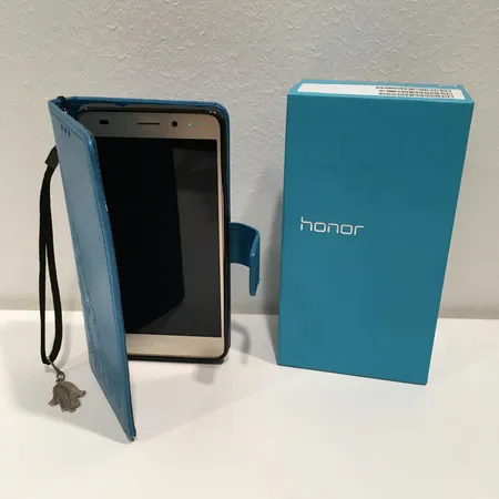 Puhelin Honor 7 lite, takuu voimassa 7/2019, suojakuori laturi ja laatikko