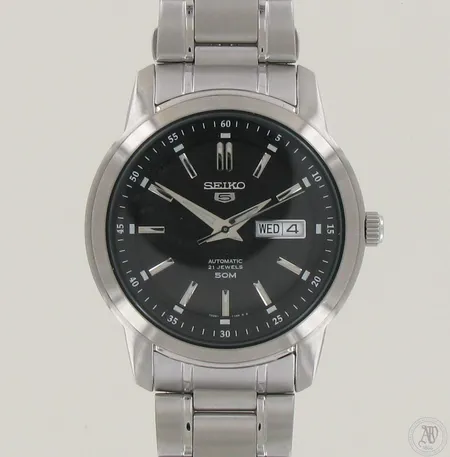 Teräsrannekello Seiko 5 Automatic 21 jewels 50m, taulun Ø 44mm, hihnan pituus 170mm+neljä lisäpalaa, laatikko ja paperit