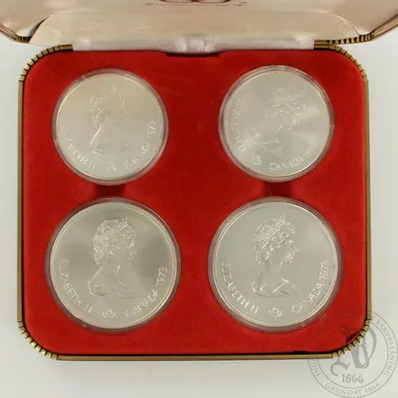 Neljä juhlarahaa, kaksi 10 Dollars Montreal 1976 Olympiade XXI, kaksi 5 Dollars Montreal 1976 Olympiade XXI, vuosilta 1973, rasia, 925br, paino 166,3g