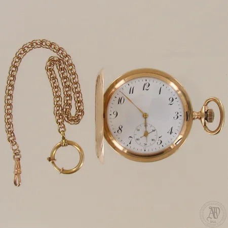 Kultataskukello Janus, 16 rubis, Spiral Breguet, 1 chaton, Ø55mm, kaiverrettu, kävikuori metallia, kellonperät 585, 585br, paino 116,4g 