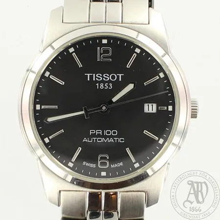 Teräsrannekello Tissot PR100, Automaatti, T049.407.11.057.00, taulun Ø38mm, rannekkeessa pientä käytön jälkeä, rannekkeen pituus 190mm.