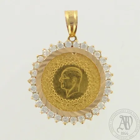 Kiviriipus kultarahalla, Turkki 50 Kurush,  korkeus 40mm, 585br ja 917, paino 7,4g 