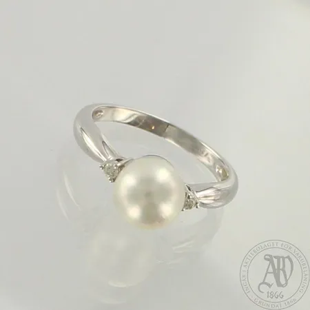 Helmisormus timanteilla 2xn.0.02ct, koko 16¾, 750br valkokulta, paino 3,5g 