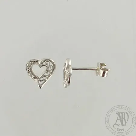 Timanttikorvakorut 4xn.0.005ct, korkeus 9mm, 585 valkokulta, paino 1,2g 