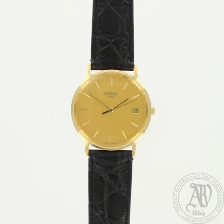 Kultarannekello Tissot, quartz, takakansi kaiverrettu ja paristo loppunut, Ø 33mm, nahkarannekkeen pituus 165-205mm, 585br, paino 27,8g