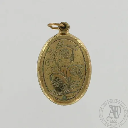 Medaljonki Kalevala Koru, korkeus 31mm, pronssi