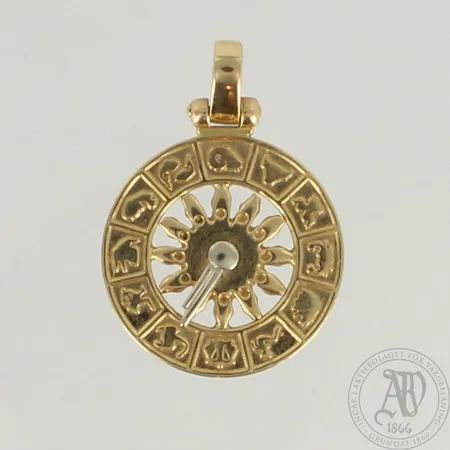 Horoskooppiriipus, korkeus 35mm, 585 kelta- ja valkokulta, paino 8,5g 