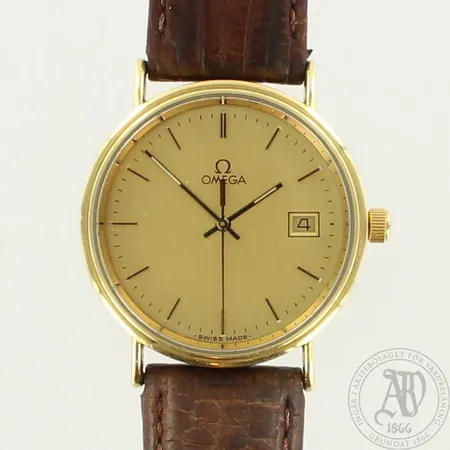 Kultarannekello Omega, kaiverrettu, taulun Ø 32mm, ranneke viallinen ja käytön jälkiä, quartz: paristo loppunut, 750br, paino 29,4g 
