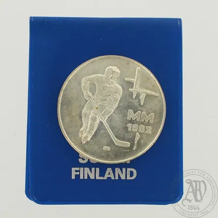 Juhlaraha, jääkiekon MM 1982, nimellisarvo 50mk, 500, paino 22,9g