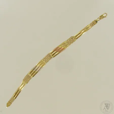 Kaulakoru, pituus 195mm, 750 kelta-, puna- ja valkokulta, paino 12,9g