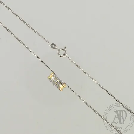Panssarikaulaketju timanttiriipuksella 12xn.0.01ct ja 8xn.0.02ct baguette, riipuksen korkeus 12mm, ketjun pituus 50cm, 585 kelta- ja valkokulta, paino 4,6g 