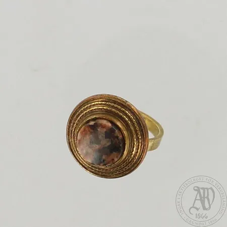 Kivisormus, Kalevala Koru, koko 17, pronssi
