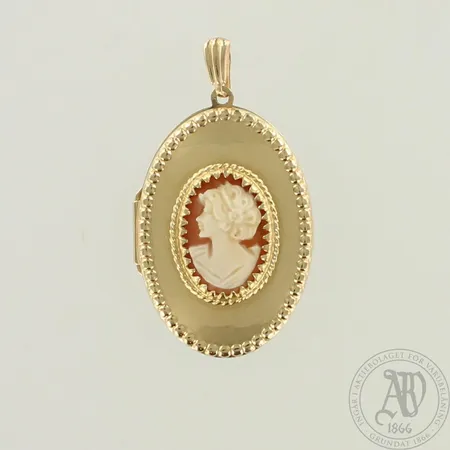 Camee-medaljonki, kaiverrettu, korkeus 48mm, 585br, paino 9,9g 