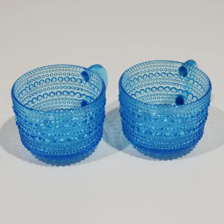 Kaksi glögimukia Iittala, Kastelhelmi, korkeus 50mm Lähetetään postipakettina.