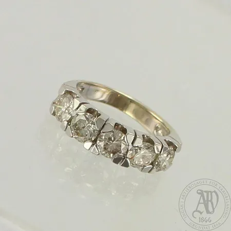 Timanttisormus 2xn.0.37ct ja 3xn.0.32ct, koko 14¾, 585 valkokulta, paino 4,3g