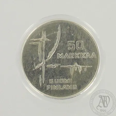 Juhlaraha, jääkiekon MM 1982, nimellisarvo 50mk, 500, paino 22,9g 