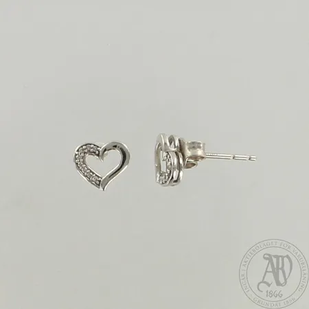 Timanttikorvakorut 16xn.0.005ct, korkeus 7mm, 585br, paino 1,0g 
