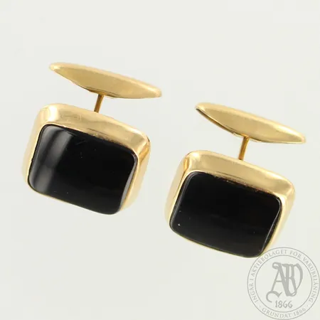 Kivikalvosinnapit, mitat 19x19mm, kivissä pieniä naarmuja, 585br, paino 8,9g 