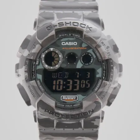 Rannekello, Casio G-Shock GD120CM, Ø 50mm, pieni naarmu lasissa.