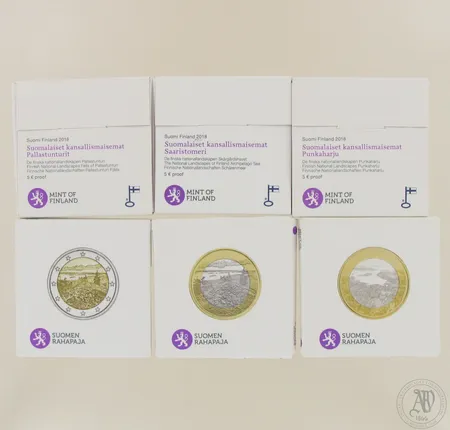 Kuusi juhlarahaa nimellisarvo 27 euroa, Suomi 2018, Suomen kansallismaisemat, Pallastunturit, Punkaharju, Saaristomeri, Merellinen Helsinki ja Kolit.  